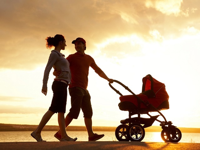 Family walk at sunset